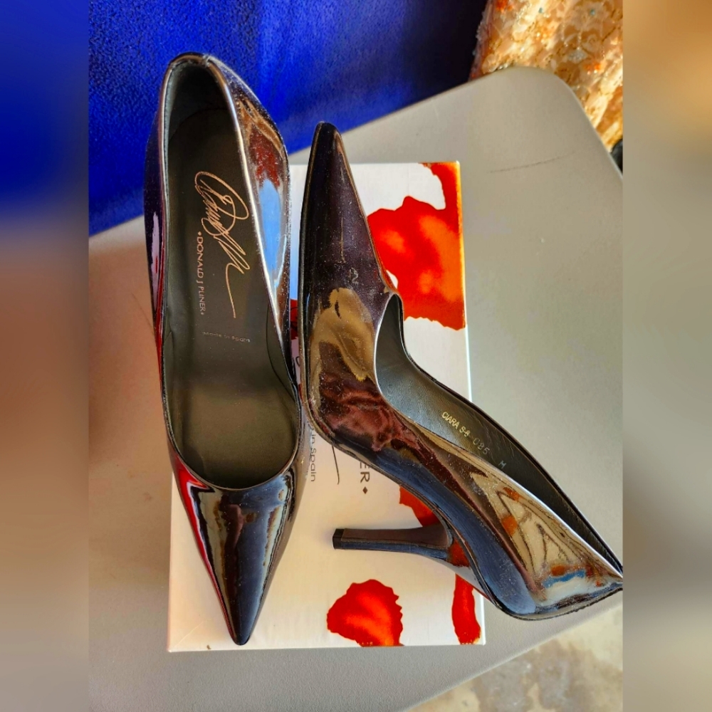 Black pearlized patent Donald J Pliner pumps, size 8.5